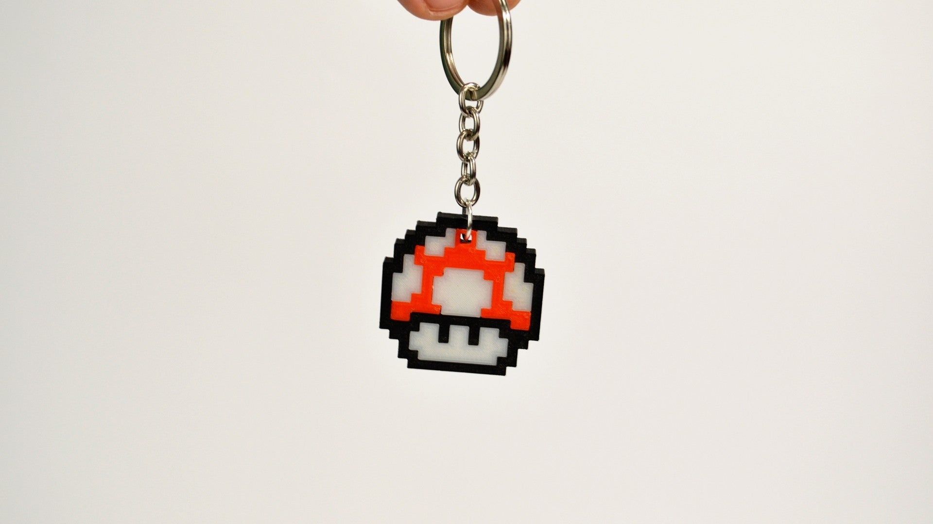 Llavero hongo estilo 8-bit